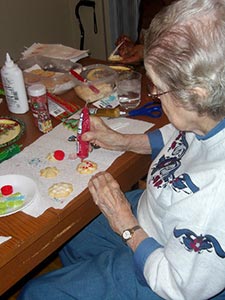 resident decorating Christmas cookies