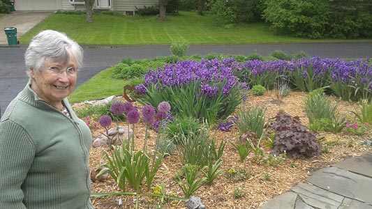 resident shows off gardens